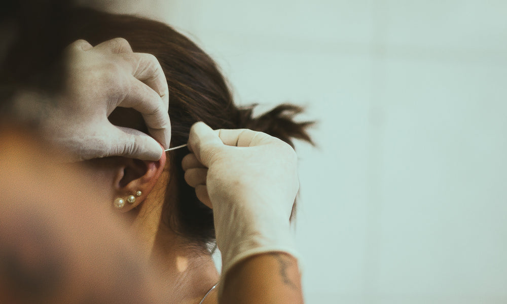 Needles Vs Ear-Piercing Instrument Piercings - The Big Debate - Caress Ltd