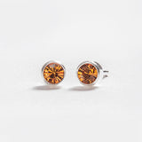 November – Topaz Bezel Set - Caress Ltd
