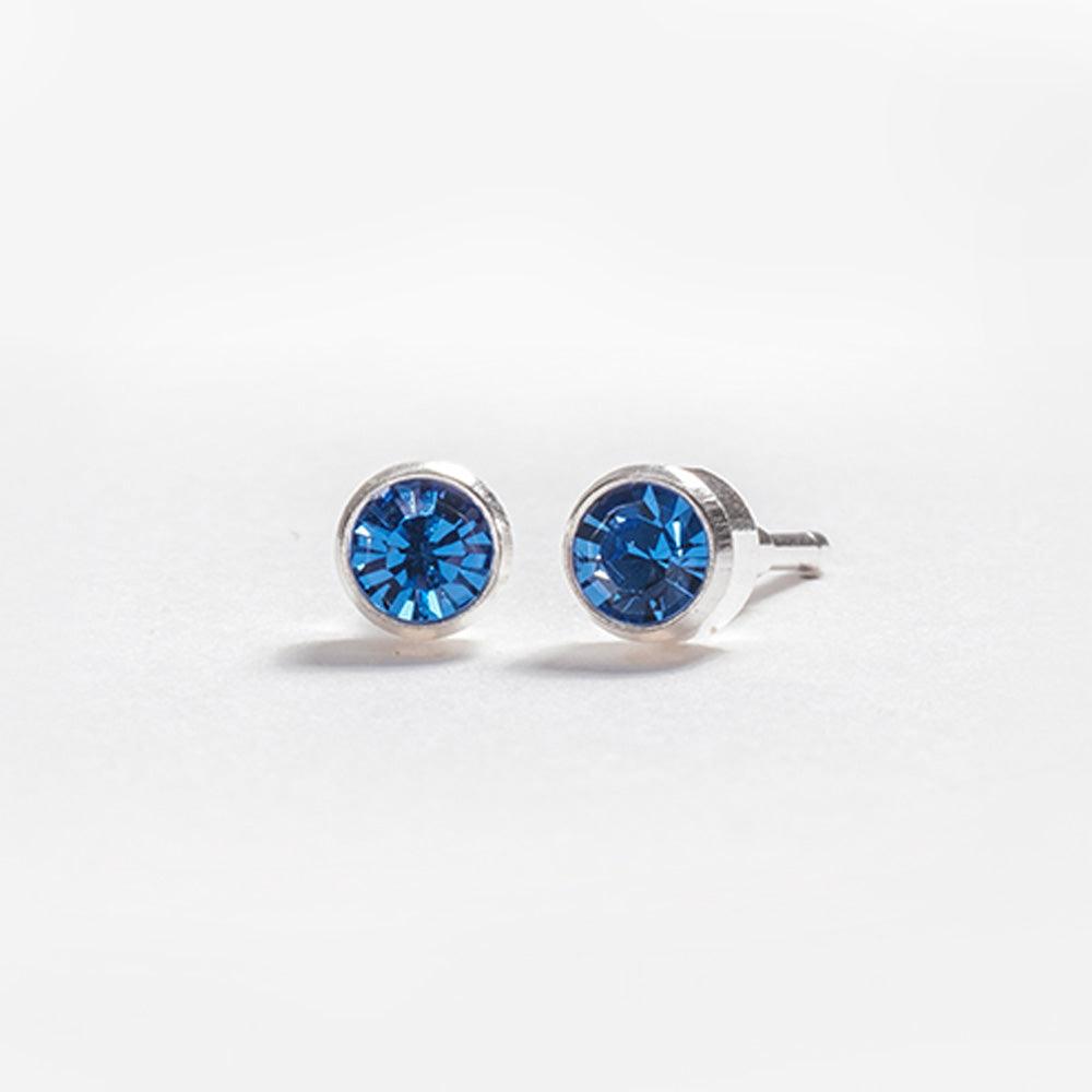September – Sapphire Bezel Set - Caress Ltd