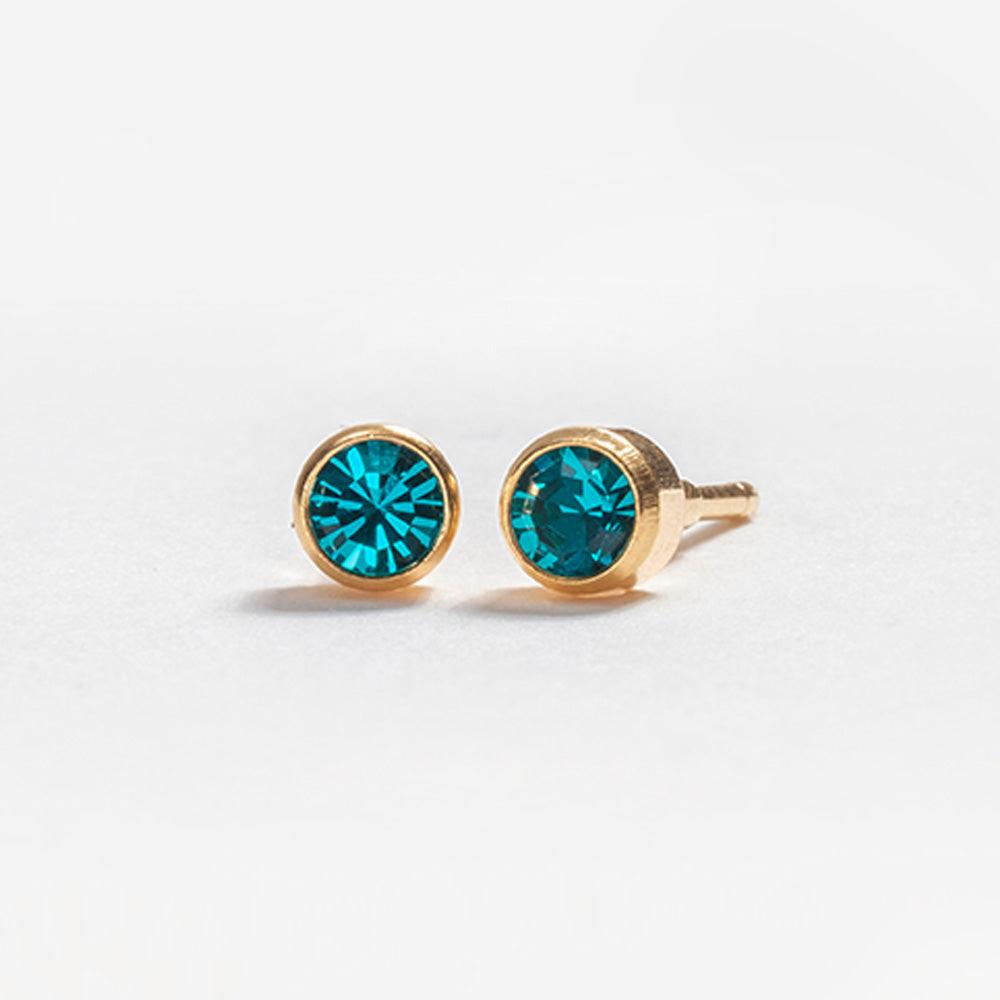 December – Blue Zircon Bezel Set - Caress Ltd