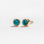 December – Blue Zircon Bezel Set - Caress Ltd